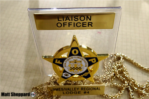 LiasionBadge