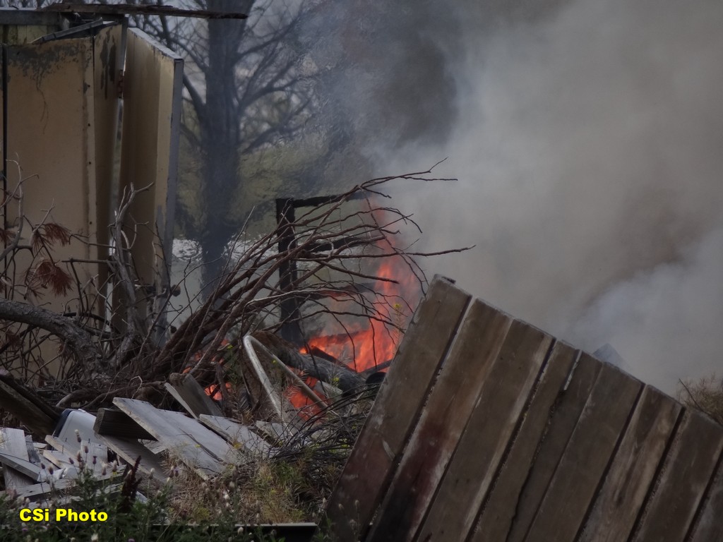 Fire behind Garden District, Business Loop East Sunday   CSi photo