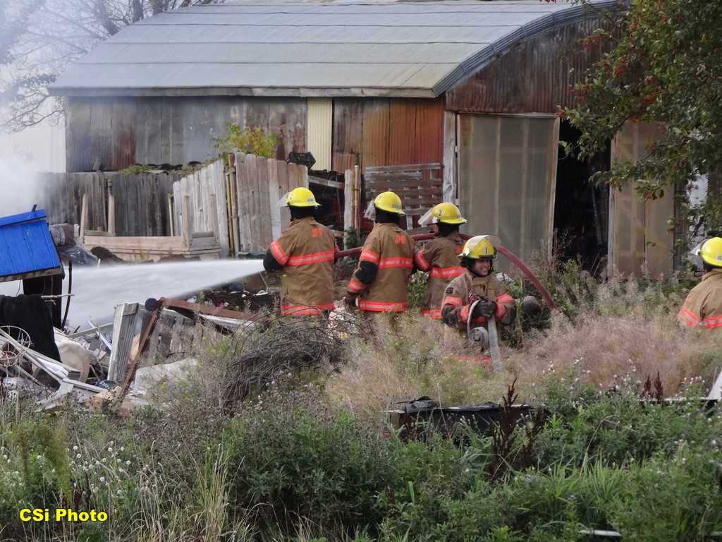 Fire Behind Garden District on Business Loop East    CSi photo