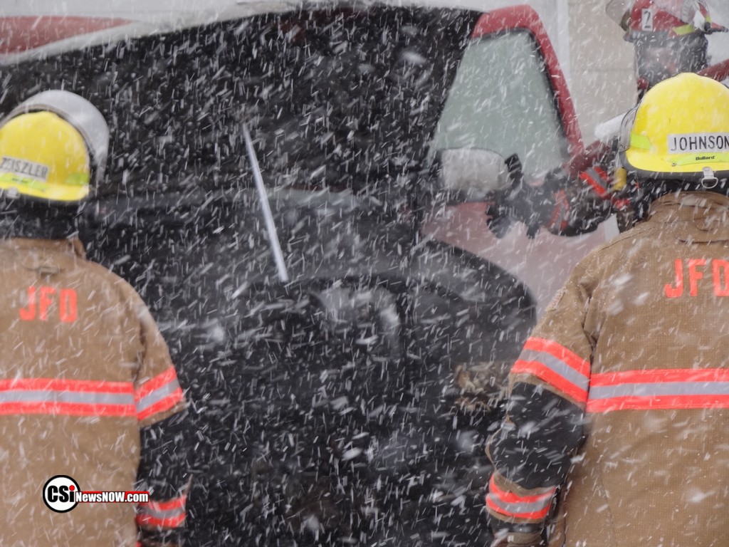 Fire destroys snowmobile & truck NE Jamestown . CSi Photos
