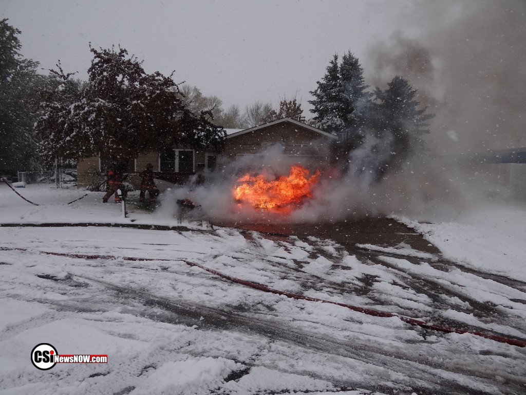Fire destroys snowmobile & truck NE Jamestown . CSi Photos