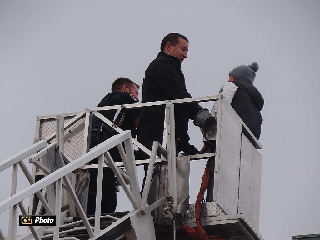 Jamestown Police & Fire Dept remove person from roof - CSi Photos