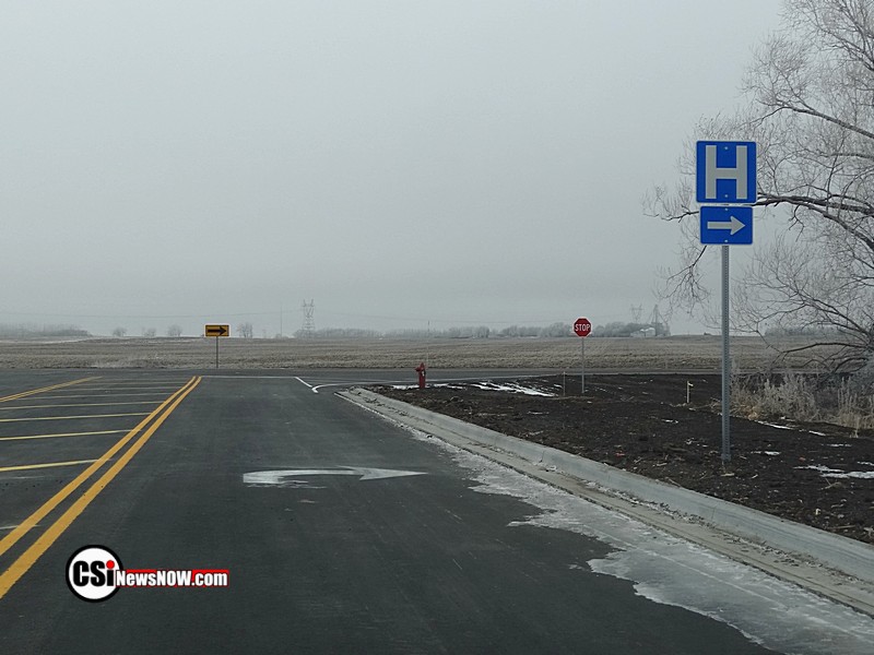 Junction with Stop sign, New Menards Road to the East          CSi photo