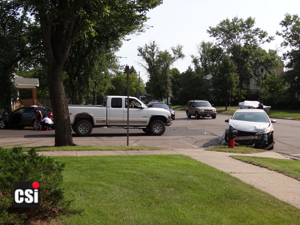 Two car crash 6th St & 4th Ave SE Jamestown Aug 9.  CSi Photo