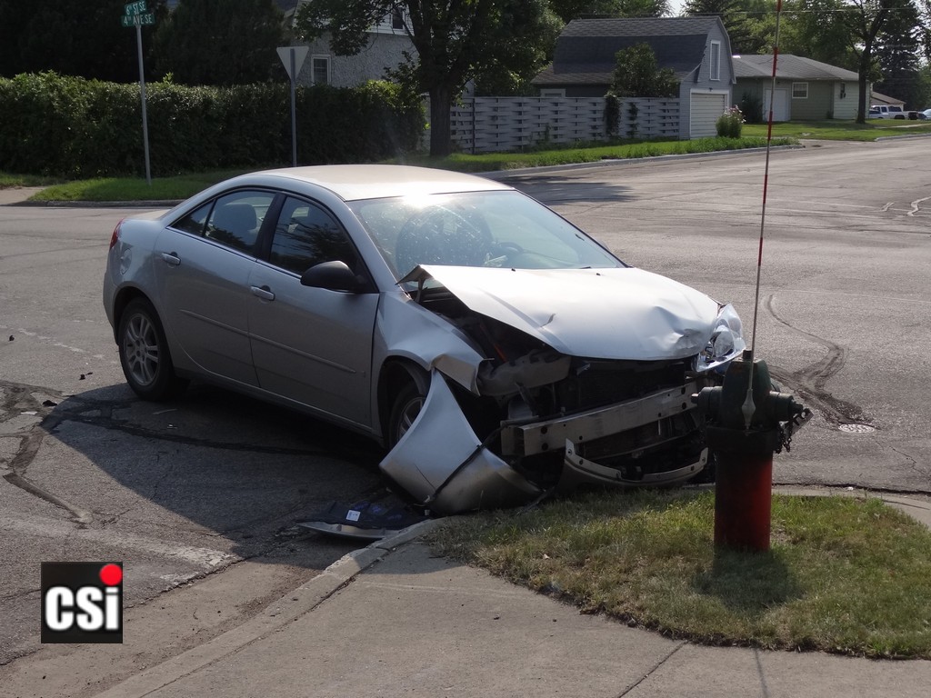 Two car crash 6th St & 4th Ave SE Jamestown Aug 9.  CSi Photo