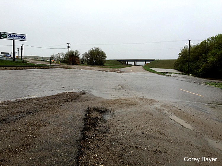 Water crossing the road at 19th Ave SE & 17th Str SE