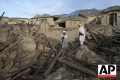 Afghans bury dead, dig for survivors of devastating quake