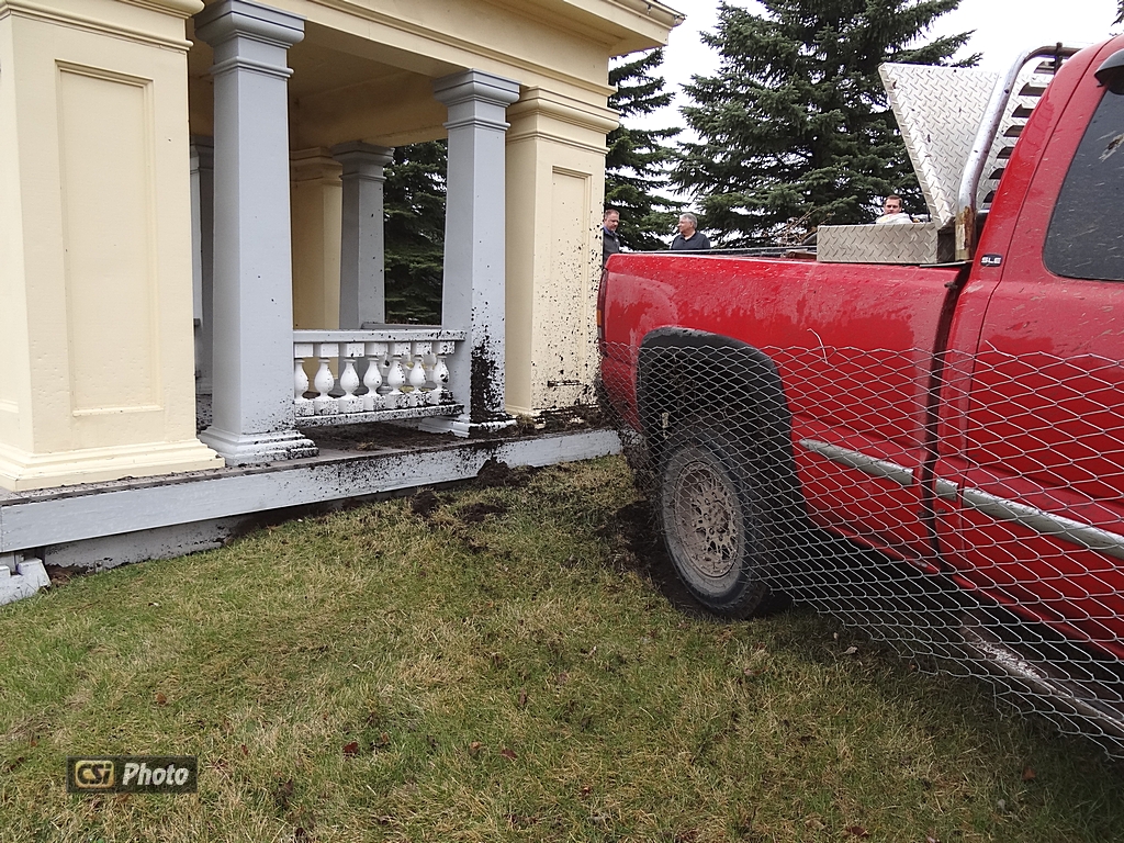 Truck stalls in Zonta Park, tangled in web of fence. More CSi Pixs at Facebook