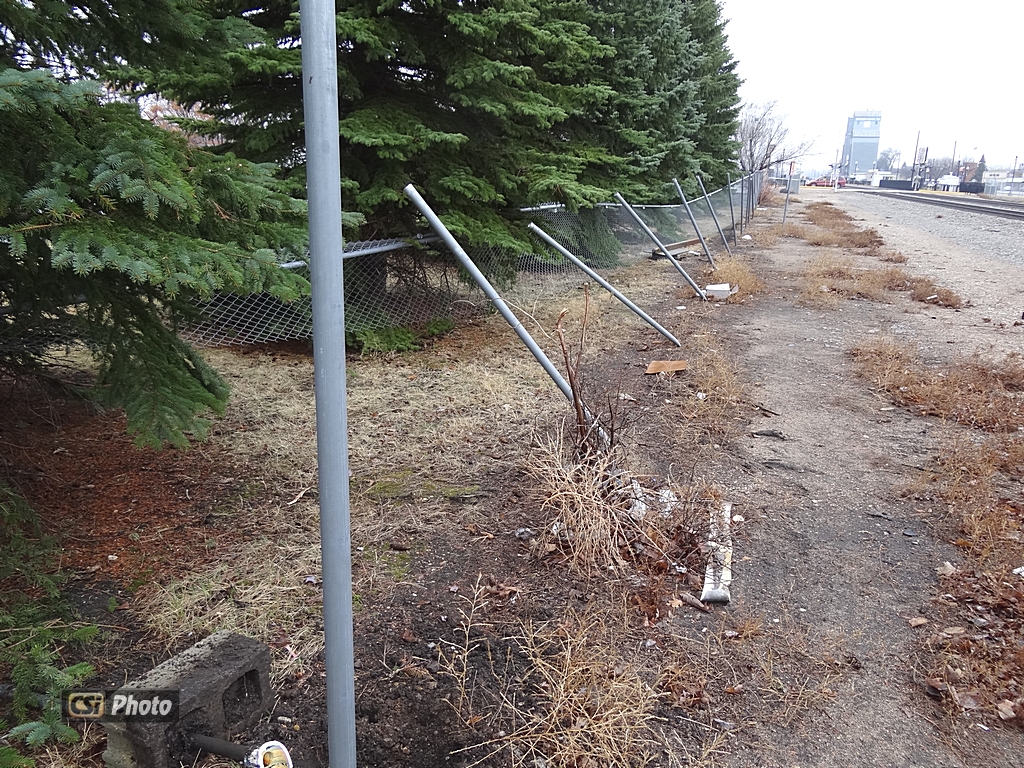 Fence stretches, but stops truck. More CSi Pixs at Facebook