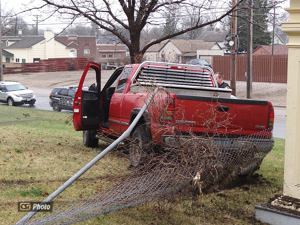 Truck tangled in fence, at Zonta Park. More CSi Pixs at Facebook