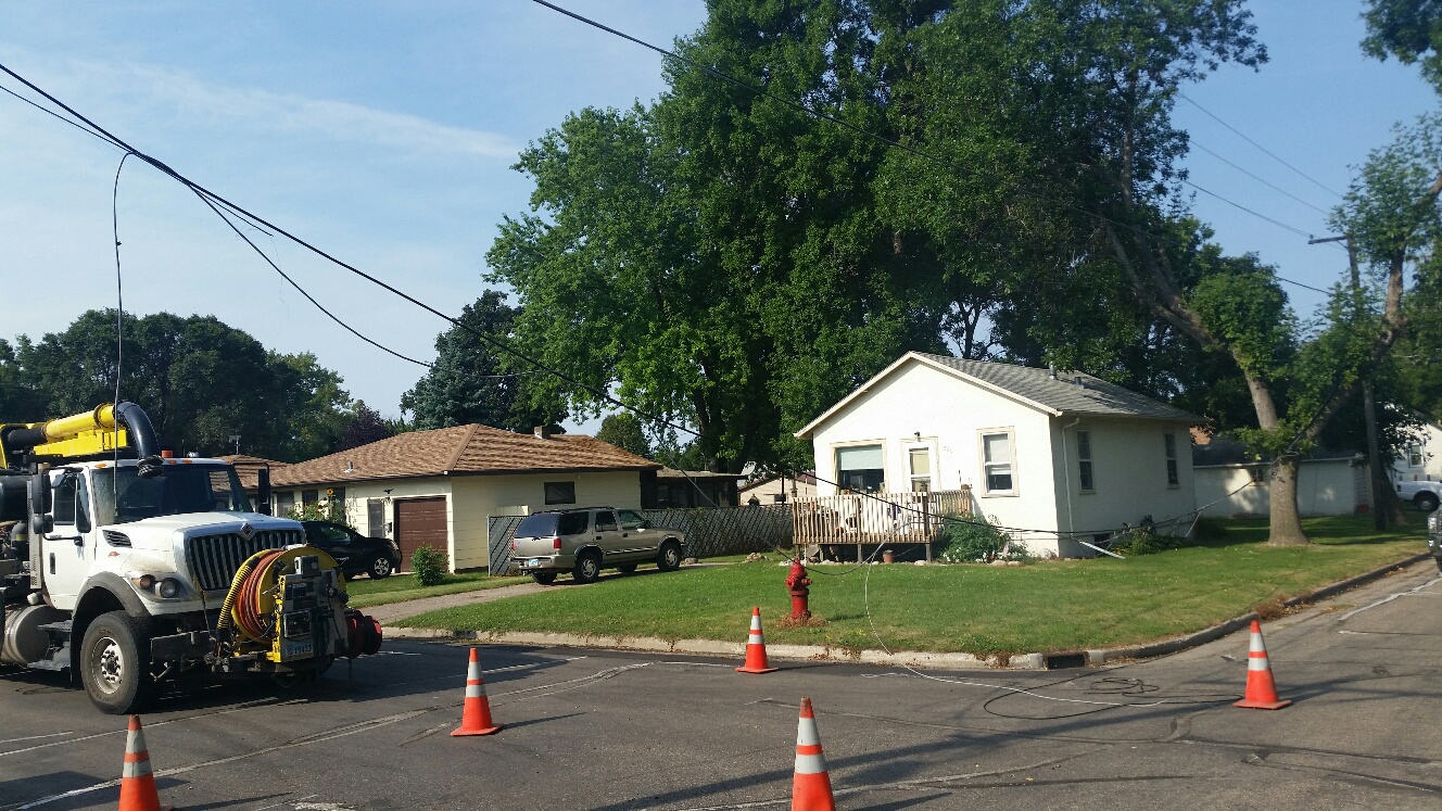 CenturyLink line torn down by sewer truck - CSi photos