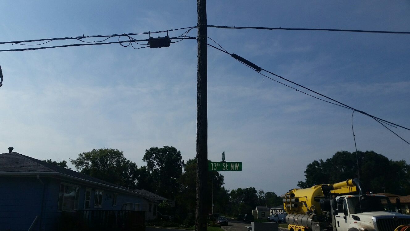 CenturyLink line torn down by sewer truck - CSi photos