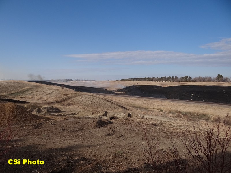 Rural fire west of Hwy 281 Bypass near BNSF tracks April 12, 2016.  CSi Photo Thomas Ravely