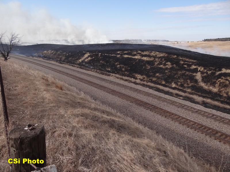 Rural fire west of Hwy 281 Bypass near BNSF tracks April 12, 2016.  CSi Photo Thomas Ravely