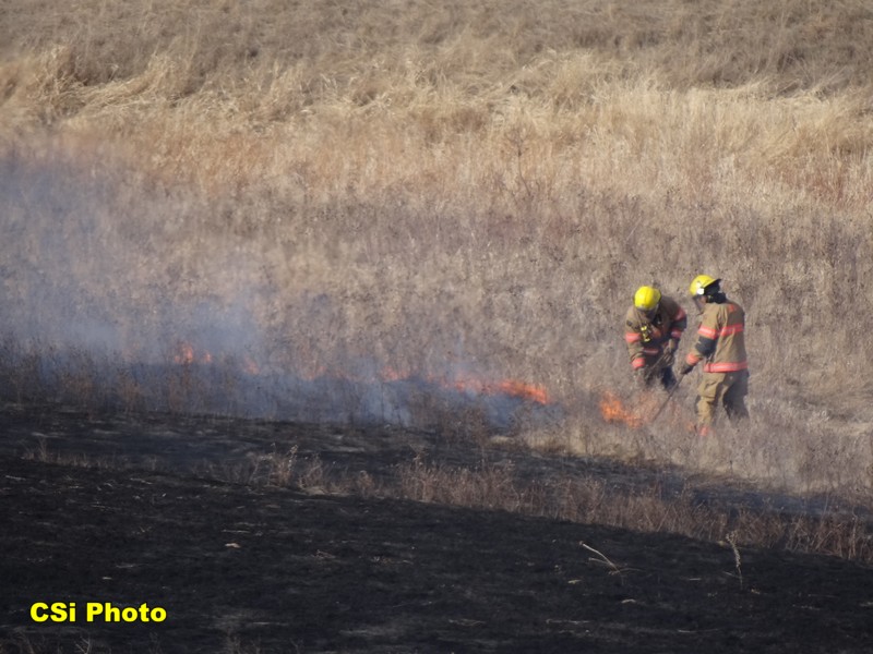 Rural fire west of Hwy 281 Bypass near BNSF tracks April 12, 2016.  CSi Photo Thomas Ravely