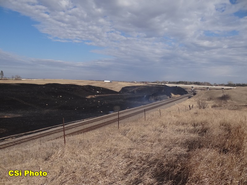 Rural fire west of Hwy 281 Bypass near BNSF tracks April 12, 2016.  CSi Photo Thomas Ravely