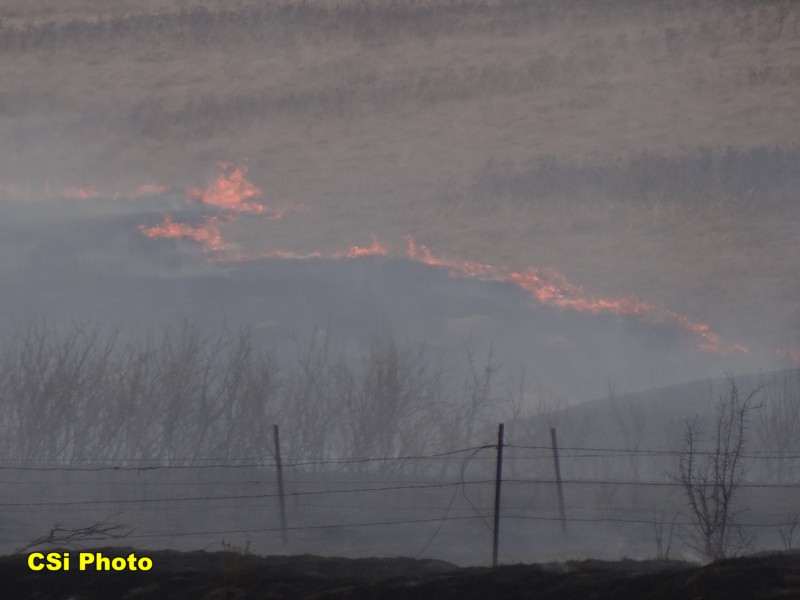 Rural fire west of Hwy 281 Bypass near BNSF tracks April 12, 2016.  CSi Photo Thomas Ravely